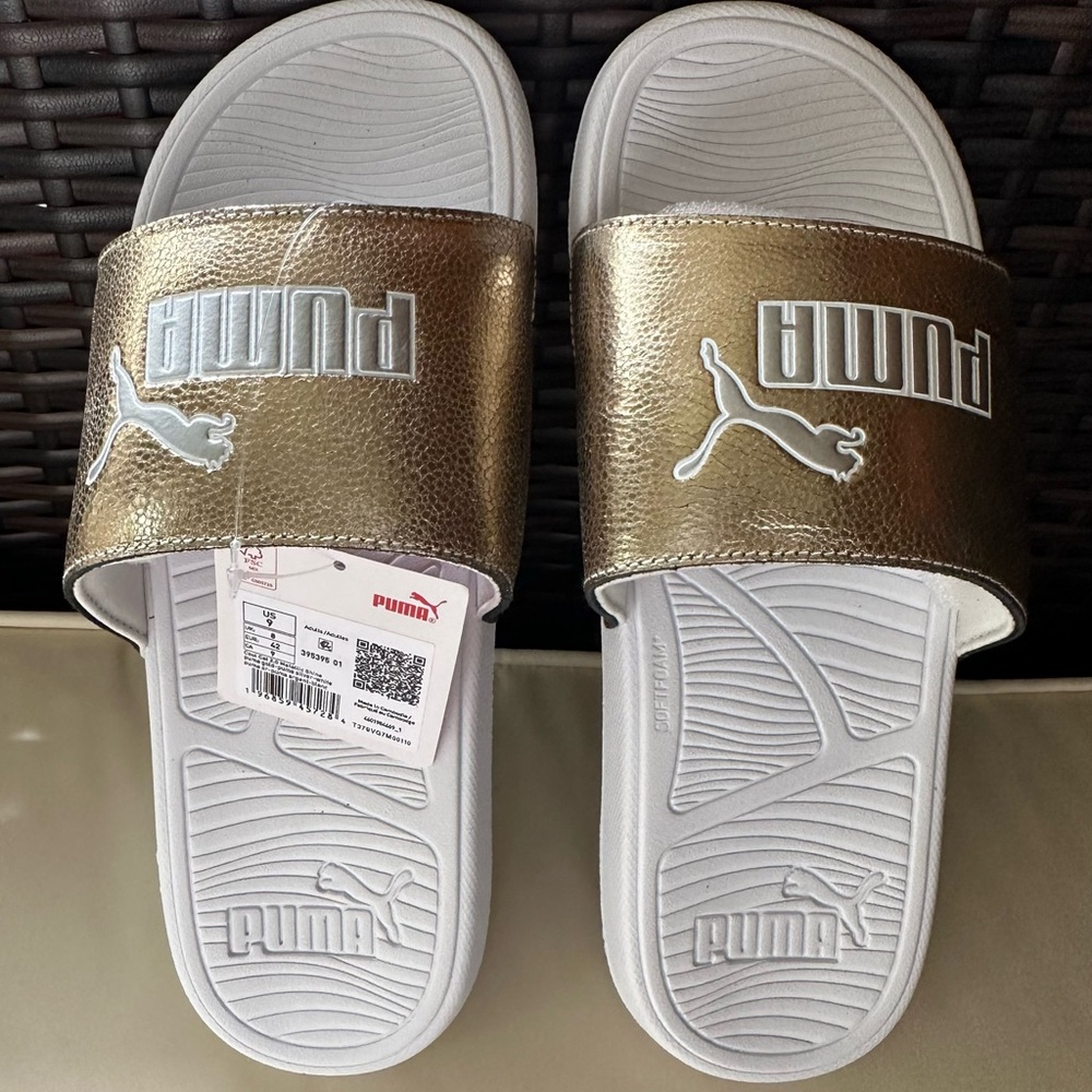 NWT PUMA Cool Cat 2.0 Slide Sandal
(Women) 9M
PUMA GOLD-PUMA SILVER-WHITE COLOR - Picture 2 of 5